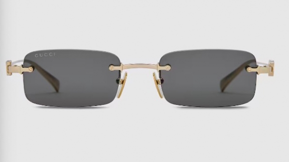 Gucci Rectangular frame sunglasses Variation gold-toned