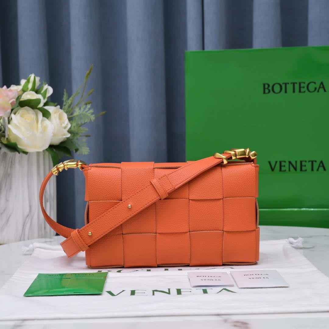 Bottega Veneta BV 666870 Cassette Intreccio grained leather cross-body bag Orange