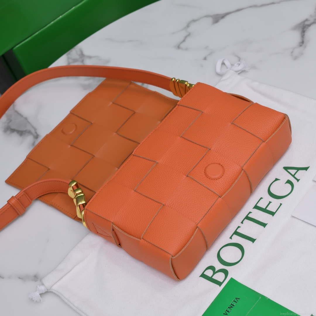 Bottega Veneta BV 666870 Cassette Intreccio grained leather cross-body bag Orange