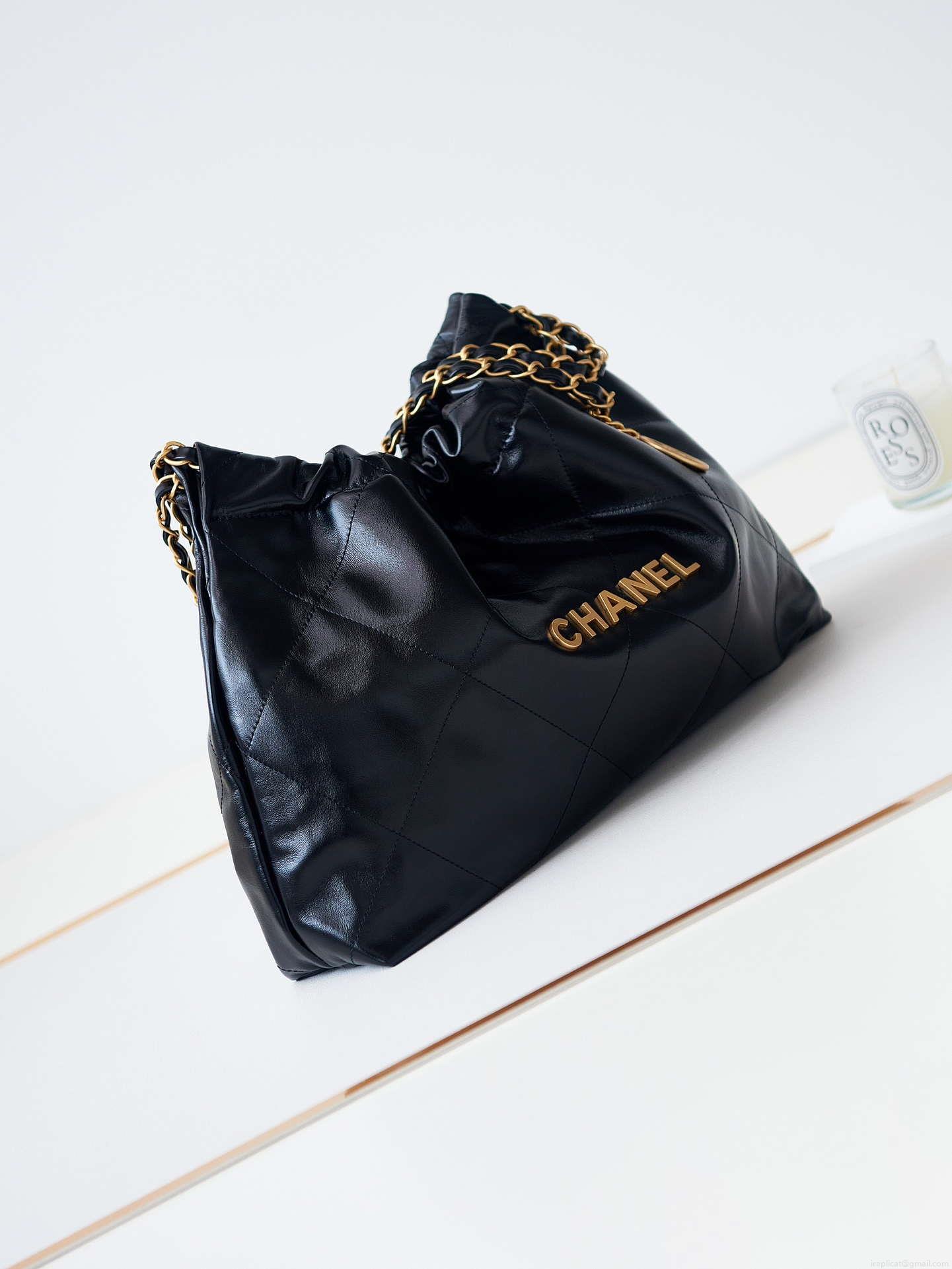 Chanel 22 Bag AS4486 Small Handbag Shiny Calfskin Black With Gold
