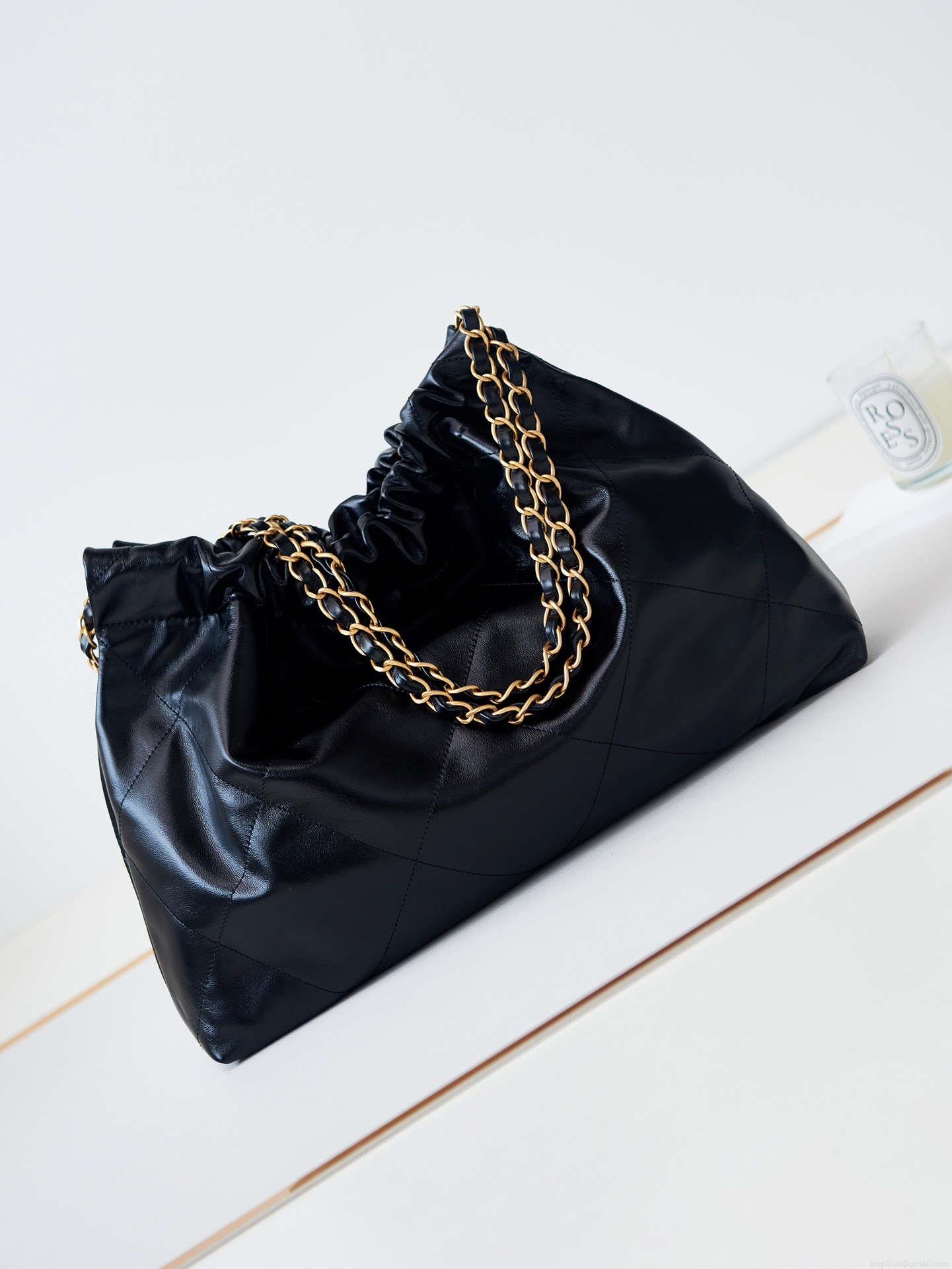 Chanel 22 Bag AS4486 Small Handbag Shiny Calfskin Black With Gold