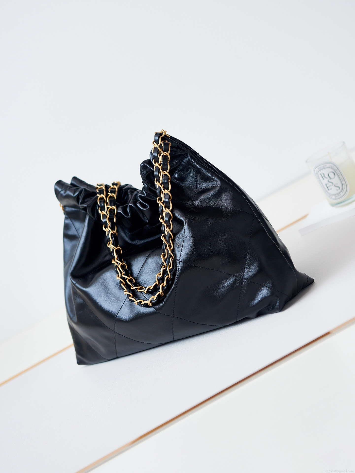 Chanel 22 Bag AS4486 Small Handbag Shiny Calfskin Black With Gold