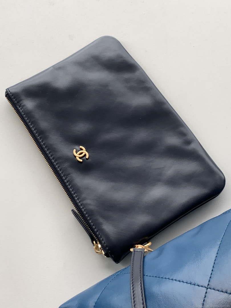 Chanel 22 Mini Handbag AS3980 Shiny Calfskin & Gold-Tone Metal Navy Blue