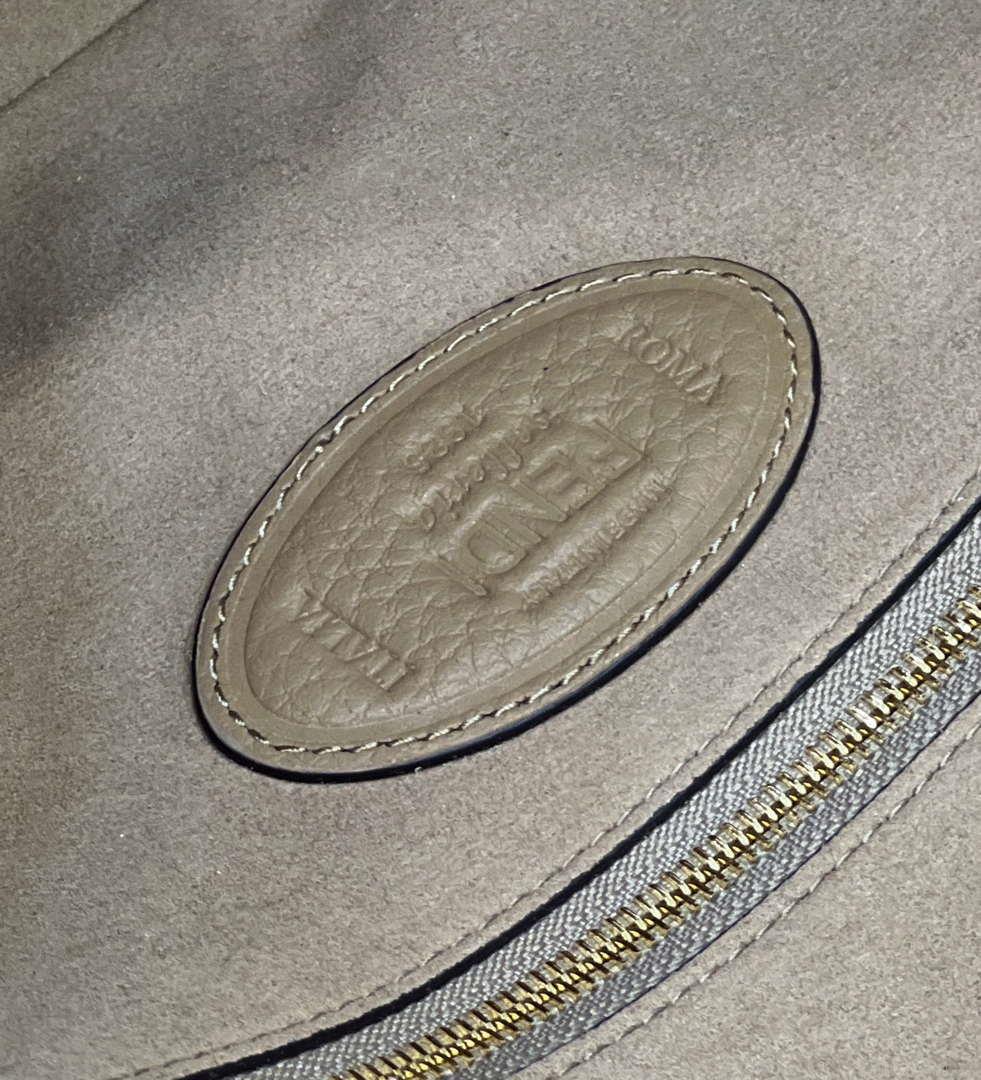 Fendi 8BR600 Baguette Medium Re-Edition bag in camel lamé sheepskin