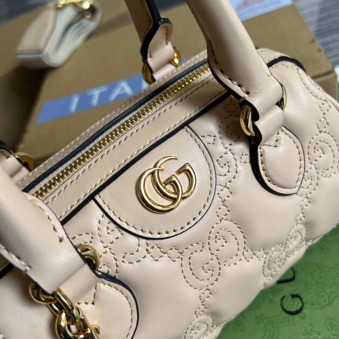 Gucci 702251 GG matelassé leather top handle bag Beige