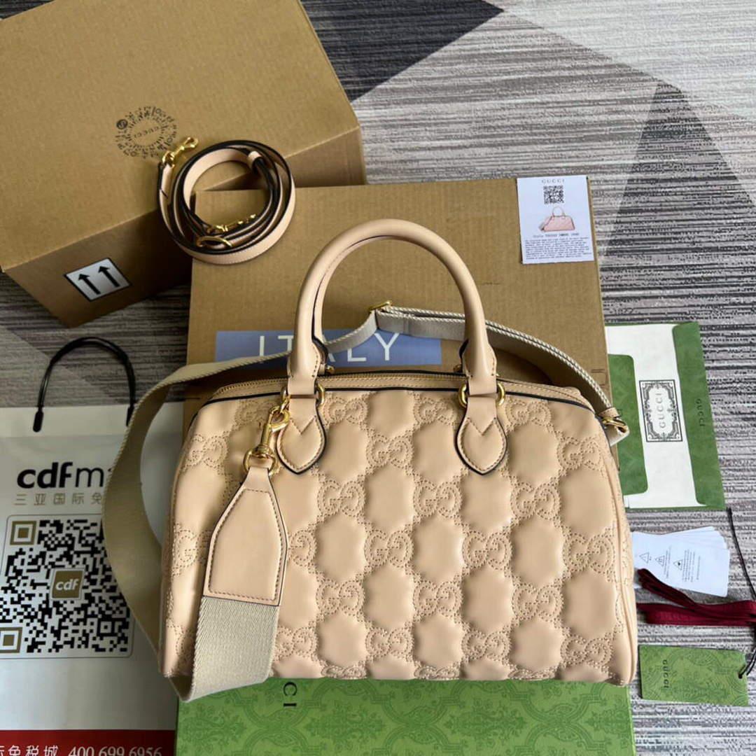 Gucci 702242 GG matelassé leather shoulder bag Beige