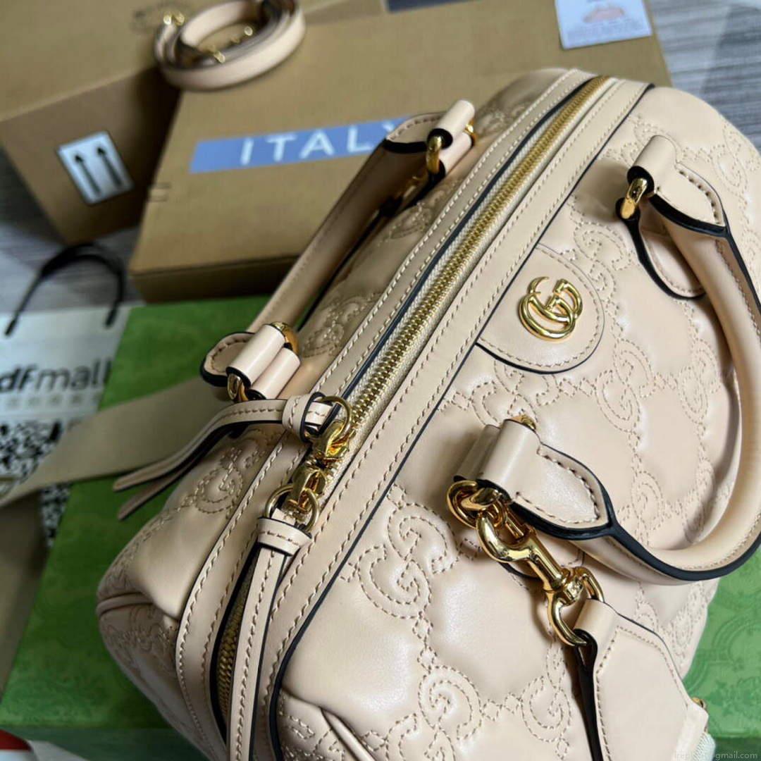 Gucci 702242 GG matelassé leather shoulder bag Beige