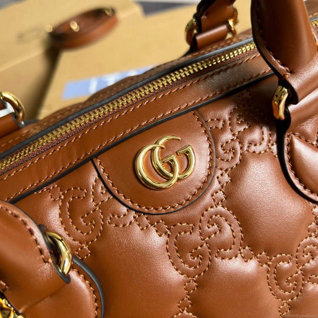 Gucci 702242 GG matelassé leather shoulder bag Brown