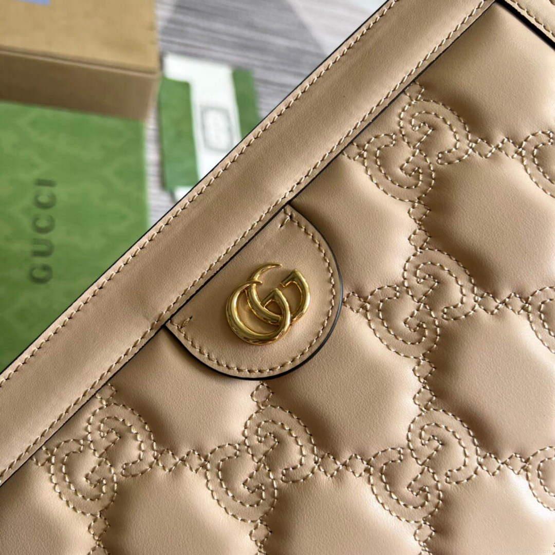 Gucci 702200 GG matelassé leather shoulder bag Beige