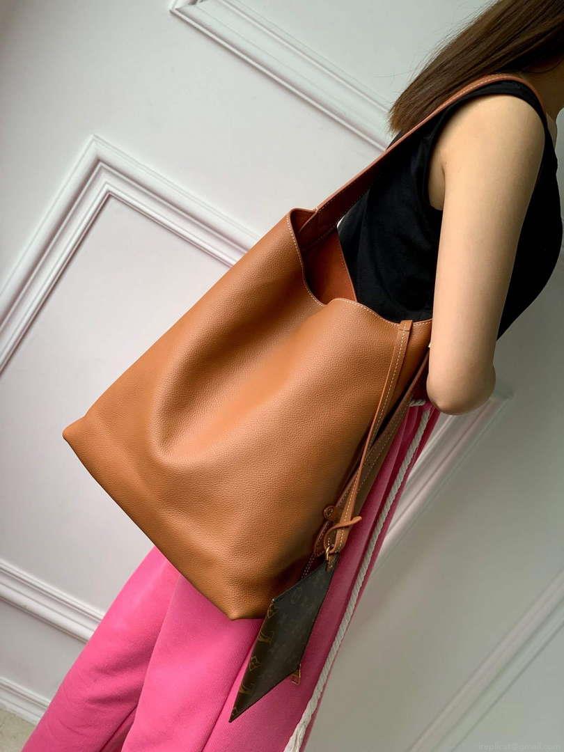 LV M24974 Louis Vuitton Low Key Hobo MM Handbag Cognac Brown