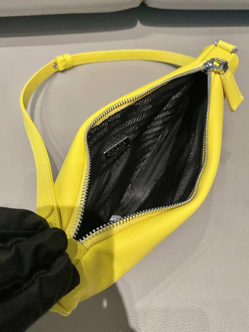 Prada 1NQ043 Triangle leather pouch Yellow