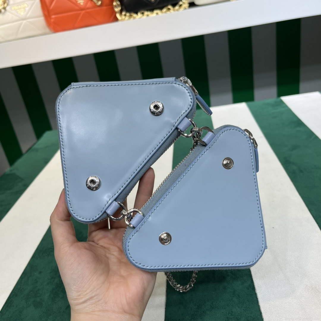 Prada 1NR015 Embellished satin and leather mini-pouch Blue