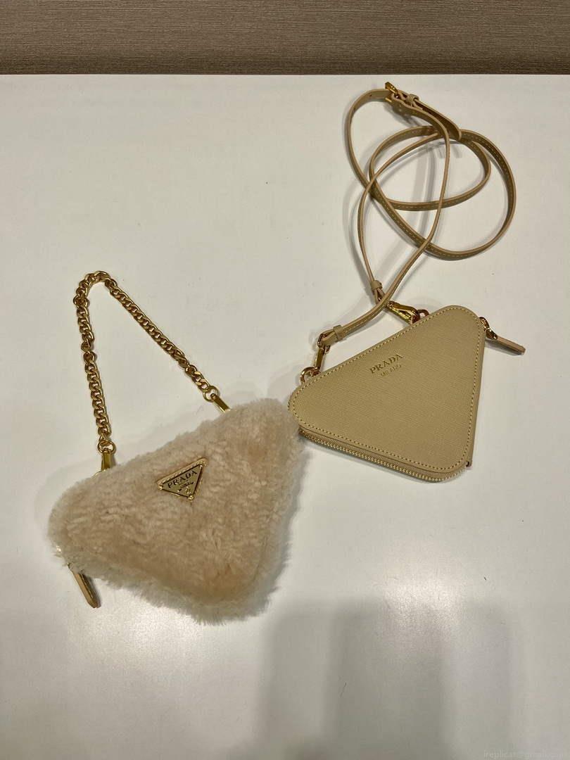 Prada 1NR015 Shearling and Saffiano leather mini-pouch Gold