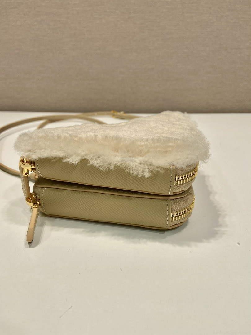 Prada 1NR015 Shearling and Saffiano leather mini-pouch Gold
