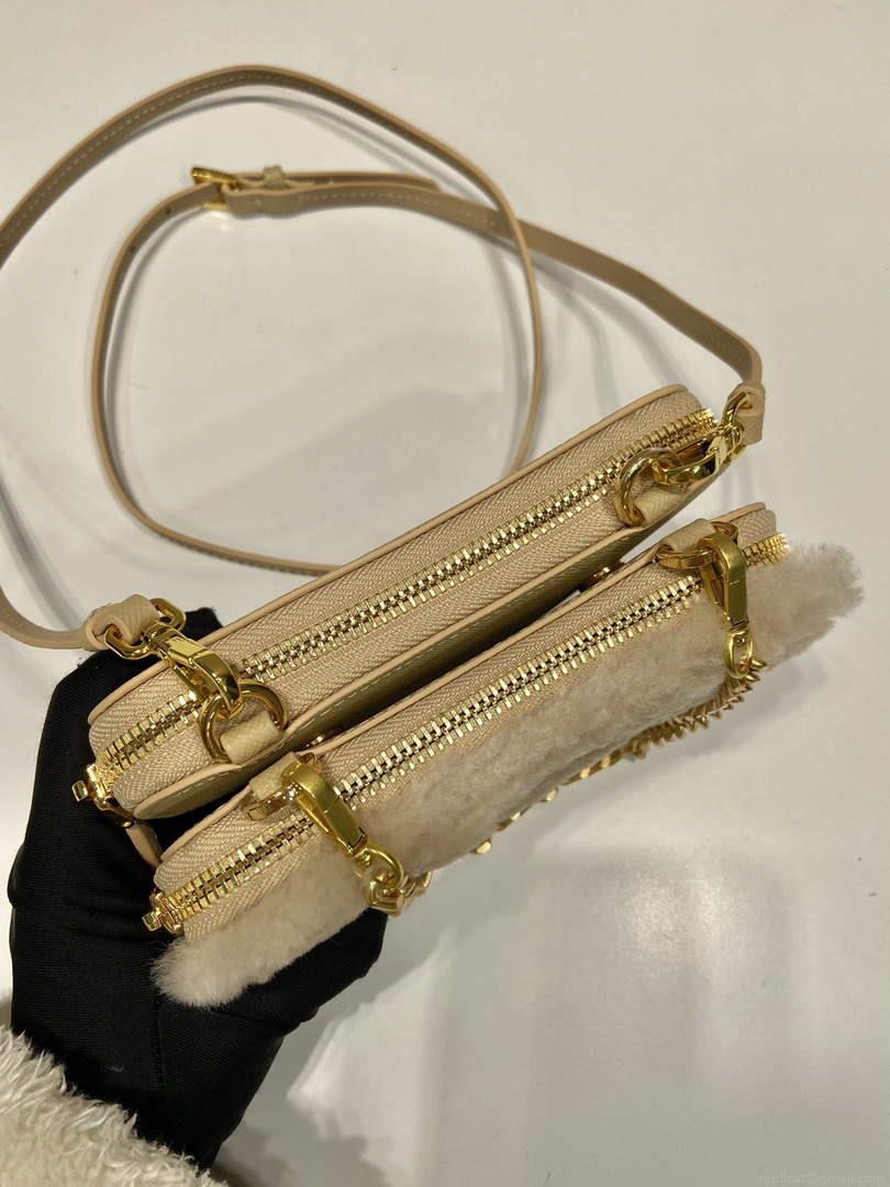 Prada 1NR015 Shearling and Saffiano leather mini-pouch Gold