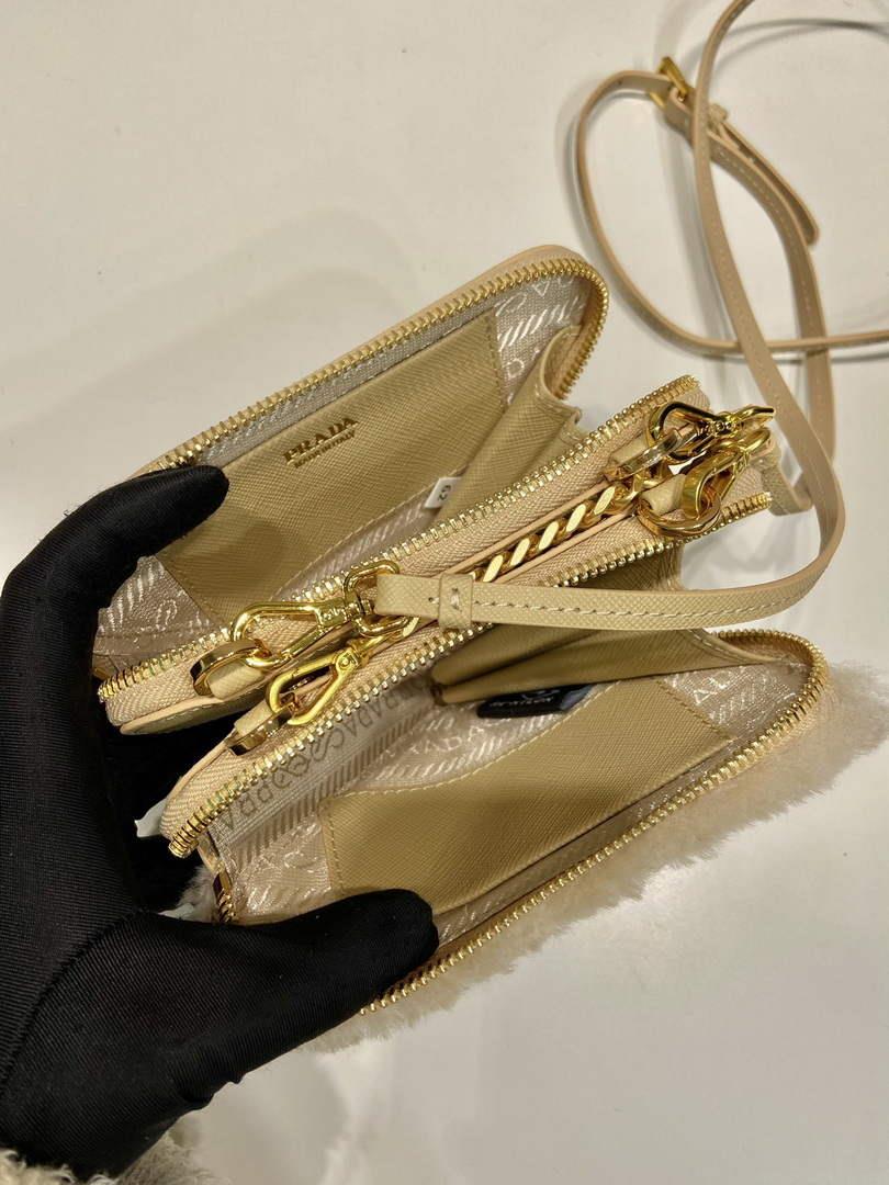 Prada 1NR015 Shearling and Saffiano leather mini-pouch Gold